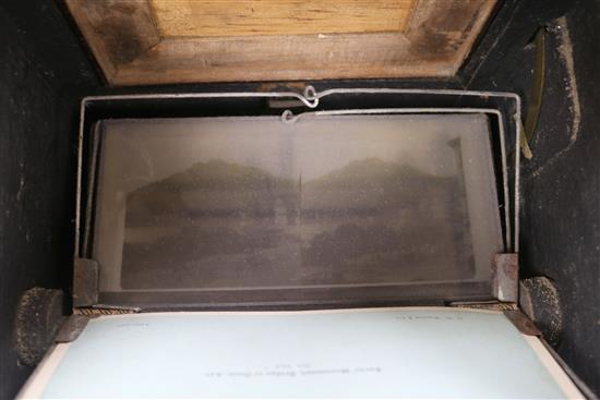 A Victorian burr walnut table top stereoscope viewer with slides/photos